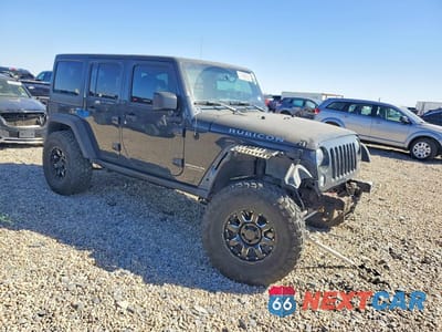 Czwarte zdjęcie samochodu z boku: 2017 JEEP WRANGLER UNLIMITED RUBICON VIN:1C4HJWFG7HL659999 - miniatura