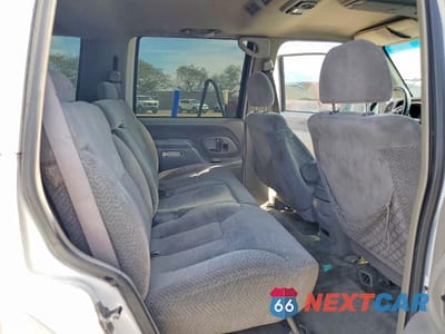 Zdjęcie 11 z 14 samochodu: 1999 CHEVROLET TAHOE C1500 VIN:1GNEC13R8XR118291 - miniatura