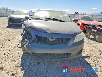 Piąte zdjęcie samochodu w środku: 2010 TOYOTA COROLLA LE VIN:2T1BU4EE1AC319732 - miniatura