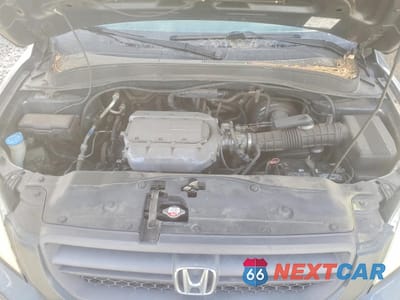 Zdjęcie 12 z 13 samochodu: 2004 HONDA PILOT EXL VIN:2HKYF18514H583954 - miniatura