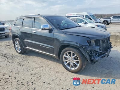 Czwarte zdjęcie samochodu z boku: 2014 JEEP GRAND CHEROKEE SUMMIT VIN:1C4RJFJT6EC130774 - miniatura