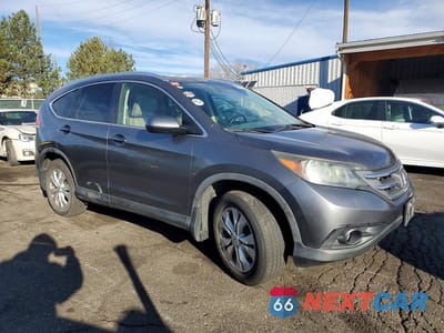 Czwarte zdjęcie samochodu z boku: 2012 HONDA CR-V EXL VIN:JHLRM4H74CC017216 - miniatura