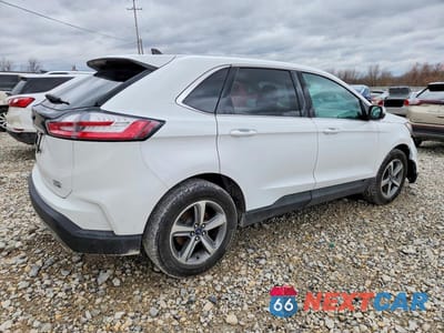 Trzecie zdjęcie samochodu z tyłu: 2020 FORD EDGE SEL VIN:2FMPK4J91LBB50341 - miniatura
