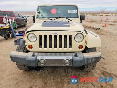 Piąte zdjęcie samochodu w środku: 2011 JEEP WRANGLER UNLIMITED SPORT VIN:1J4BA3H10BL615826 - miniatura