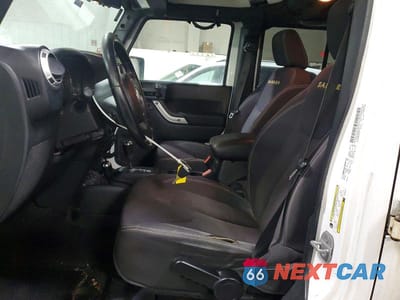 Zdjęcie 7 z 11 samochodu: 2013 JEEP WRANGLER UNLIMITED SAHARA VIN:1C4BJWEG3DL539148 - miniatura