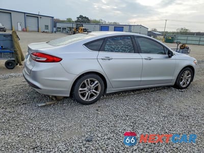 Trzecie zdjęcie samochodu z tyłu: 2018 FORD FUSION SE VIN:3FA6P0H74JR212673 - miniatura