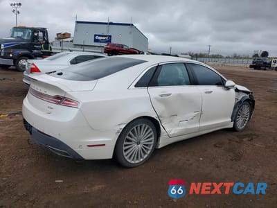 Trzecie zdjęcie samochodu z tyłu: 2017 LINCOLN MKZ HYBRID RESERVE VIN:3LN6L5MU8HR624227 - miniatura