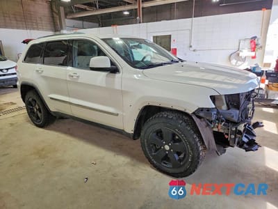Czwarte zdjęcie samochodu z boku: 2011 JEEP GRAND CHEROKEE LAREDO VIN:1J4RR4GG2BC656428 - miniatura