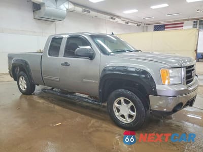 Czwarte zdjęcie samochodu z boku: 2007 GMC NEW SIERRA K1500 VIN:1GTEK19J77Z591743 - miniatura