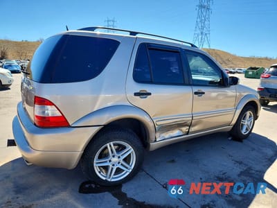 Trzecie zdjęcie samochodu z tyłu: 2002 MERCEDES-BENZ ML 320 VIN:4JGAB54E62A338691 - miniatura