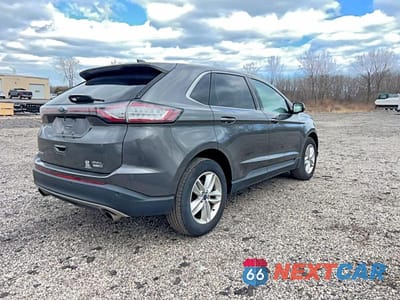 Czwarte zdjęcie samochodu z boku: 2016 FORD EDGE SEL VIN:2FMPK4J98GBC26269 - miniatura
