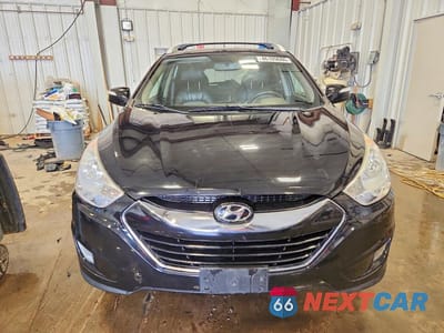 Piąte zdjęcie samochodu w środku: 2011 HYUNDAI TUCSON LIMITED VIN:KM8JUCAC7BU290215 - miniatura