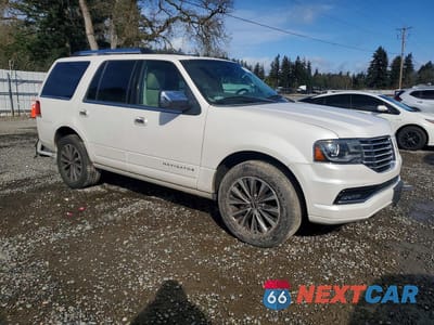 Czwarte zdjęcie samochodu z boku: 2015 LINCOLN NAVIGATOR VIN:5LMJJ2HT2FEJ02416 - miniatura