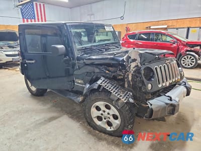 Czwarte zdjęcie samochodu z boku: 2014 JEEP WRANGLER SAHARA VIN:1C4AJWBG0EL219898 - miniatura