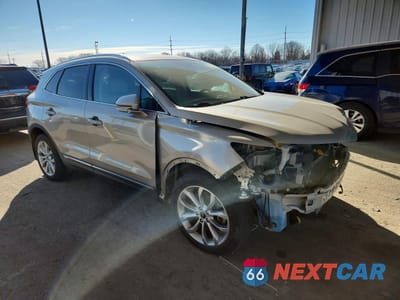 Czwarte zdjęcie samochodu z boku: 2015 LINCOLN MKC VIN:5LMCJ2A94FUJ19795 - miniatura