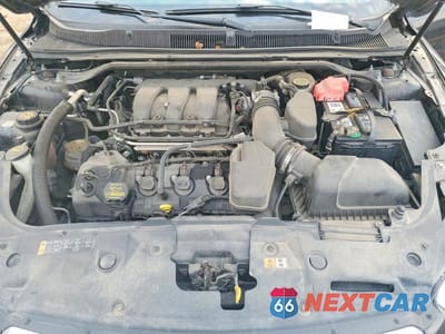 Zdjęcie 11 z 12 samochodu: 2013 FORD TAURUS SEL VIN:1FAHP2E8XDG147941 - miniatura