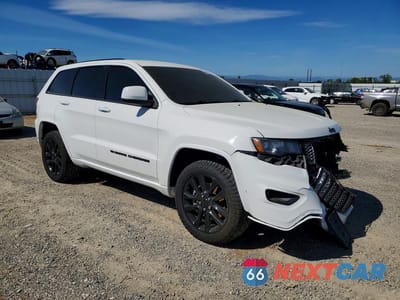 Czwarte zdjęcie samochodu z boku: 2022 JEEP GRAND CHEROKEE LAREDO E VIN:1C4RJFAG2NC120956 - miniatura