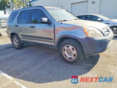 Czwarte zdjęcie samochodu z boku: 2006 HONDA CR-V LX VIN:JHLRD785X6C009447 - miniatura