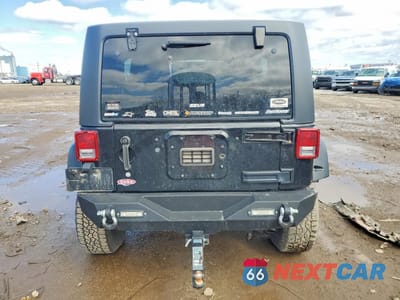 Zdjęcie 6 z 12 samochodu: 2013 JEEP WRANGLER UNLIMITED SPORT VIN:1C4BJWDG0DL590771 - miniatura