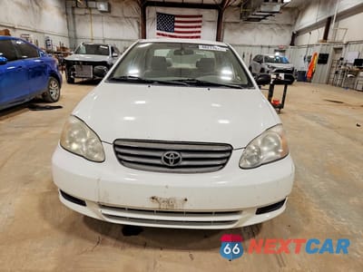 Piąte zdjęcie samochodu w środku: 2003 TOYOTA COROLLA CE VIN:JTDBR32EX30041801 - miniatura