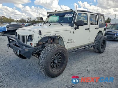 2009 JEEP WRANGLER UNLIMITED X 1J4GA39139L770935 - główne zdjęcie licytacji z USA - miniatura