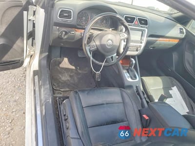 Zdjęcie 8 z 12 samochodu: 2012 VOLKSWAGEN EOS LUX VIN:WVWFW7AH8CV003080 - miniatura