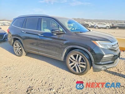 Czwarte zdjęcie samochodu z boku: 2017 HONDA PILOT TOURING VIN:5FNYF6H96HB018507 - miniatura