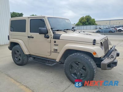 Czwarte zdjęcie samochodu z boku: 2016 JEEP WRANGLER SAHARA VIN:1C4AJWBG9GL285594 - miniatura