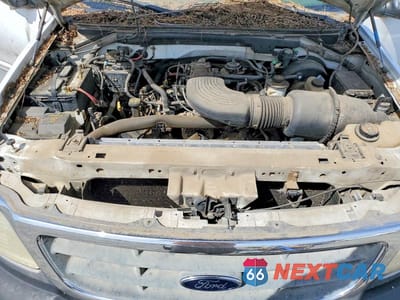 Zdjęcie 11 z 12 samochodu: 2000 FORD F150 VIN:1FTRX17L2YKA20341 - miniatura