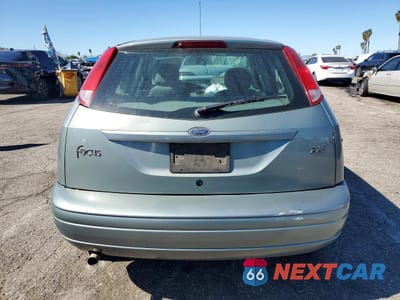 Zdjęcie 6 z 14 samochodu: 2004 FORD FOCUS ZX5 VIN:3FAFP37Z74R110972 - miniatura