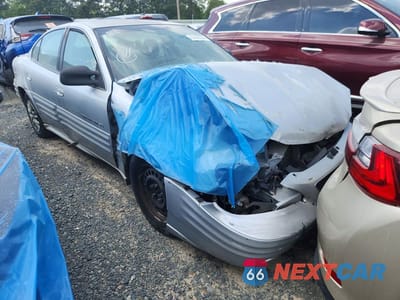 Czwarte zdjęcie samochodu z boku: 2001 PONTIAC GRAND AM SE VIN:1G2NE52T61M642054 - miniatura