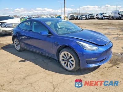 Czwarte zdjęcie samochodu z boku: 2022 TESLA MODEL 3 VIN:5YJ3E1EA8NF369865 - miniatura
