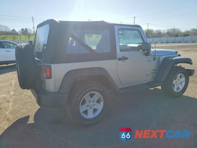 Trzecie zdjęcie samochodu z tyłu: 2017 JEEP WRANGLER SPORT VIN:1C4GJWAG5HL660877 - miniatura