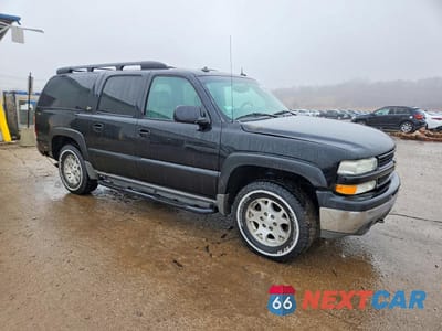 Czwarte zdjęcie samochodu z boku: 2003 CHEVROLET SUBURBAN K1500 VIN:3GNFK16Z63G241813 - miniatura
