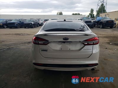 Zdjęcie 6 z 11 samochodu: 2017 FORD FUSION TITANIUM PHEV VIN:3FA6P0SU0HR141965 - miniatura