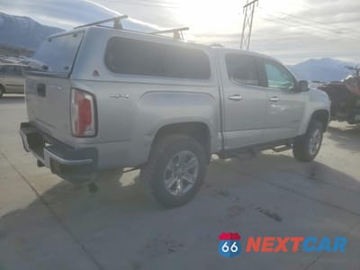 Trzecie zdjęcie samochodu z tyłu: 2017 GMC CANYON SLT VIN:1GTP6DE19H1188965 - miniatura