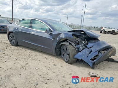 Czwarte zdjęcie samochodu z boku: 2020 TESLA MODEL 3 VIN:5YJ3E1EB9LF522081 - miniatura