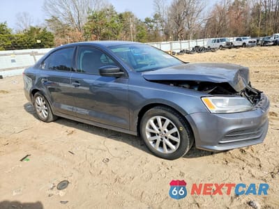 Czwarte zdjęcie samochodu z boku: 2015 VOLKSWAGEN JETTA SE VIN:3VWD17AJ9FM275089 - miniatura