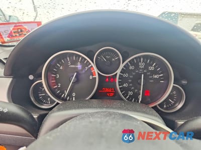 Zdjęcie 9 z 13 samochodu: 2009 MAZDA MX-5 MIATA VIN:JM1NC25F190201344 - miniatura