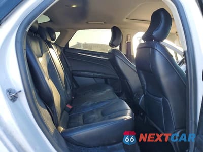 Zdjęcie 10 z 12 samochodu: 2017 FORD FUSION TITANIUM VIN:3FA6P0K90HR111120 - miniatura