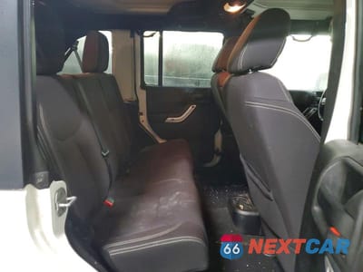 Zdjęcie 10 z 11 samochodu: 2013 JEEP WRANGLER UNLIMITED SAHARA VIN:1C4BJWEG3DL539148 - miniatura