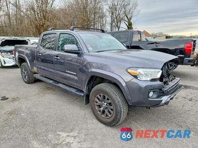 Czwarte zdjęcie samochodu z boku: 2021 TOYOTA TACOMA DOUBLE CAB VIN:3TYDZ5BN0MT004120 - miniatura