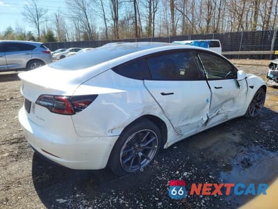 Trzecie zdjęcie samochodu z tyłu: 2021 TESLA MODEL 3 VIN:5YJ3E1EB8MF060954 - miniatura