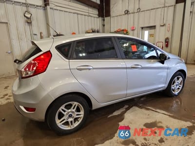 Trzecie zdjęcie samochodu z tyłu: 2017 FORD FIESTA SE VIN:3FADP4EJ7HM112704 - miniatura