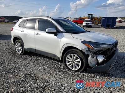 Czwarte zdjęcie samochodu z boku: 2022 TOYOTA COROLLA CROSS LE VIN:7MUCAAAG7NV002656 - miniatura