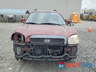 Piąte zdjęcie samochodu w środku: 2002 HYUNDAI SANTA FE GLS VIN:KM8SC13D62U312075 - miniatura