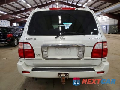 Zdjęcie 6 z 13 samochodu: 2004 LEXUS LX 470 BASE VIN:JTJHT00W343543665 - miniatura
