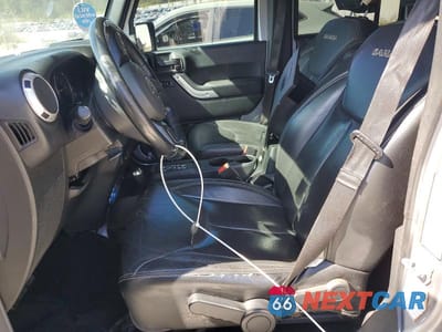 Zdjęcie 7 z 12 samochodu: 2018 JEEP WRANGLER UNLIMITED SAHARA VIN:1C4HJWEG5JL919145 - miniatura