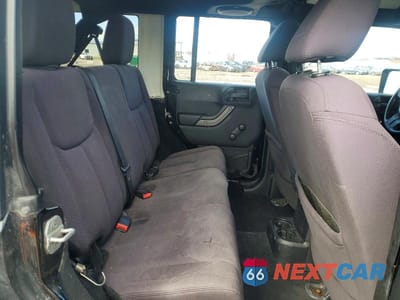 Zdjęcie 10 z 12 samochodu: 2013 JEEP WRANGLER UNLIMITED SPORT VIN:1C4BJWDG0DL590771 - miniatura