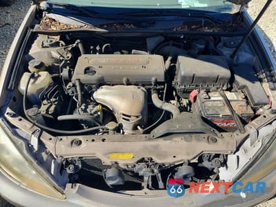 Zdjęcie 11 z 12 samochodu: 2003 TOYOTA CAMRY LE VIN:JTDBE32K630184021 - miniatura